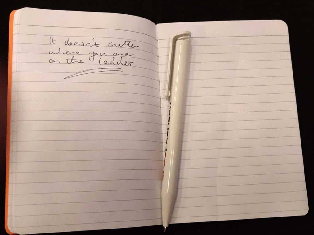 A photo of my notebook where I've written: it doesn't matter where you are on the ladder