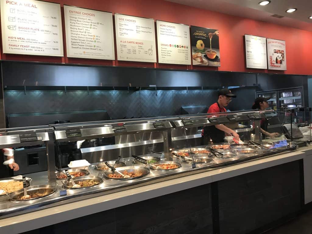 Panda Express employees making a bowl