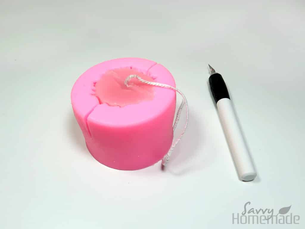 how to use silicon candle molds step 8: Using a craft knife, cut slits half way down the sides of your mold
