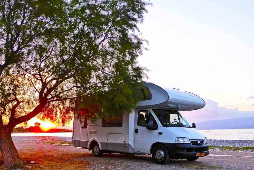 How to wild camp in the UK with a motorhome or campervan. Tips and hacks for finding the perfect wild camping spots for your road trip. Wild camping is fun- this guide will help you get it all figured out. #motorhome #camping #campervan #wild #scotland #UK #england #tips #hacks #ideas