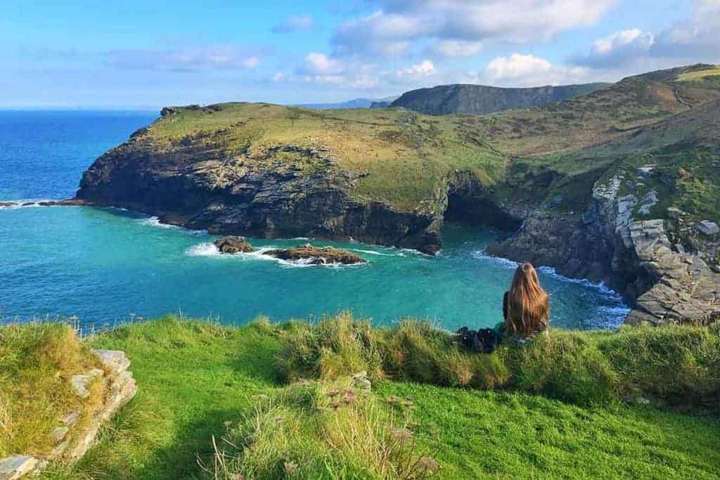 Visit the famous Tintagel Castle- home of King Arthur! We also explored the aswesome Merlin's Cave- definitely a must if you're in Cornwall. #tintagel #castle #uk #cornwall #merlin #cave #camelot #placestovisit #thingstodo #england #visit #traveltips #trave