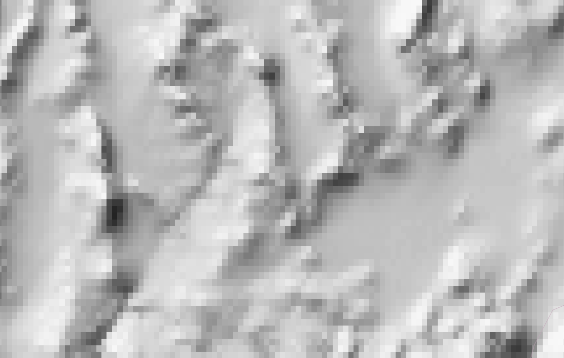 Zoom in closely to a raster dataset and you will see the individual cells. Image: Grayscale shaded relief of land areas derived from downsampled SRTM Plus elevation data. Source: Natural Earth Data.