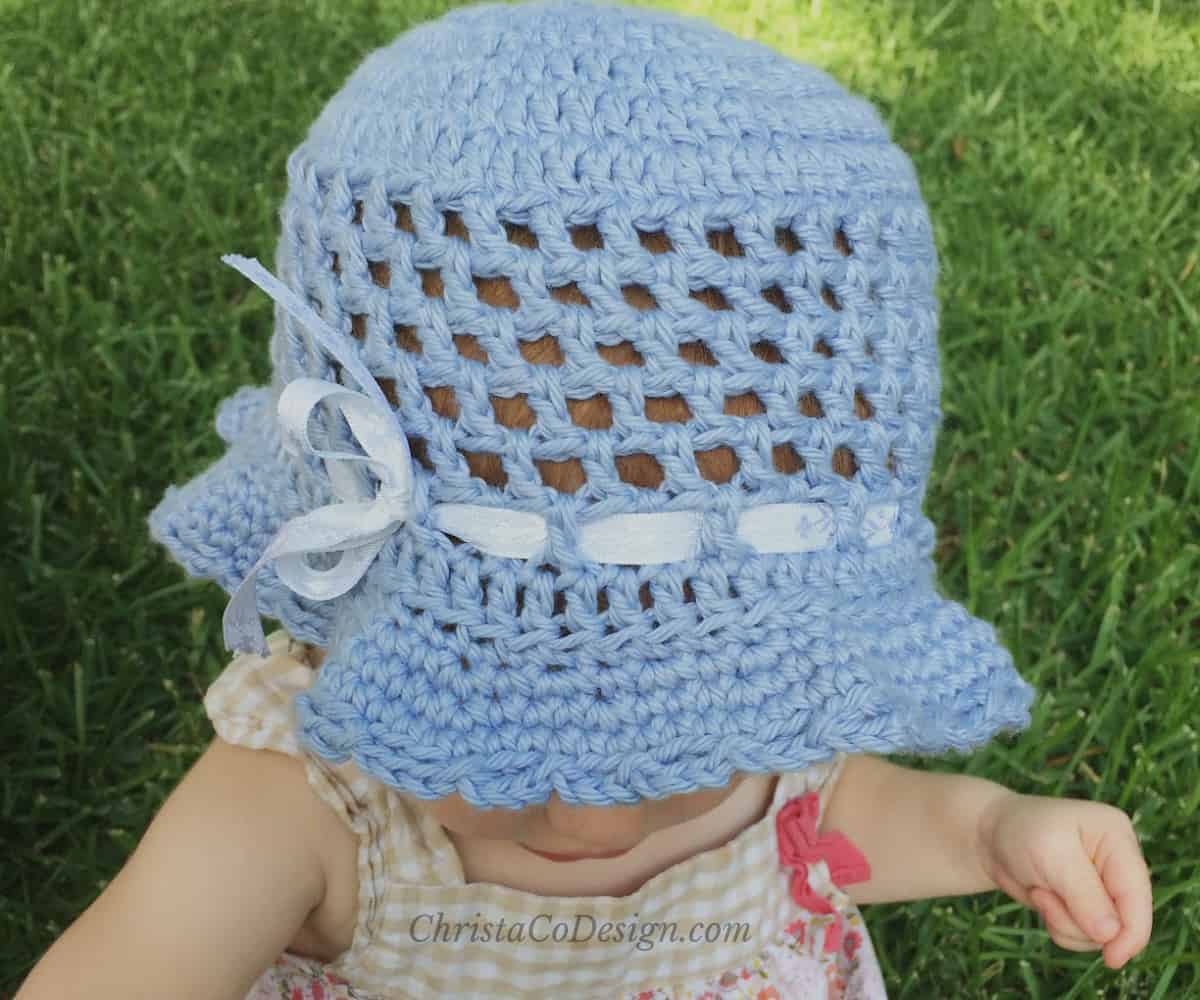 picture of toddler in sun hat