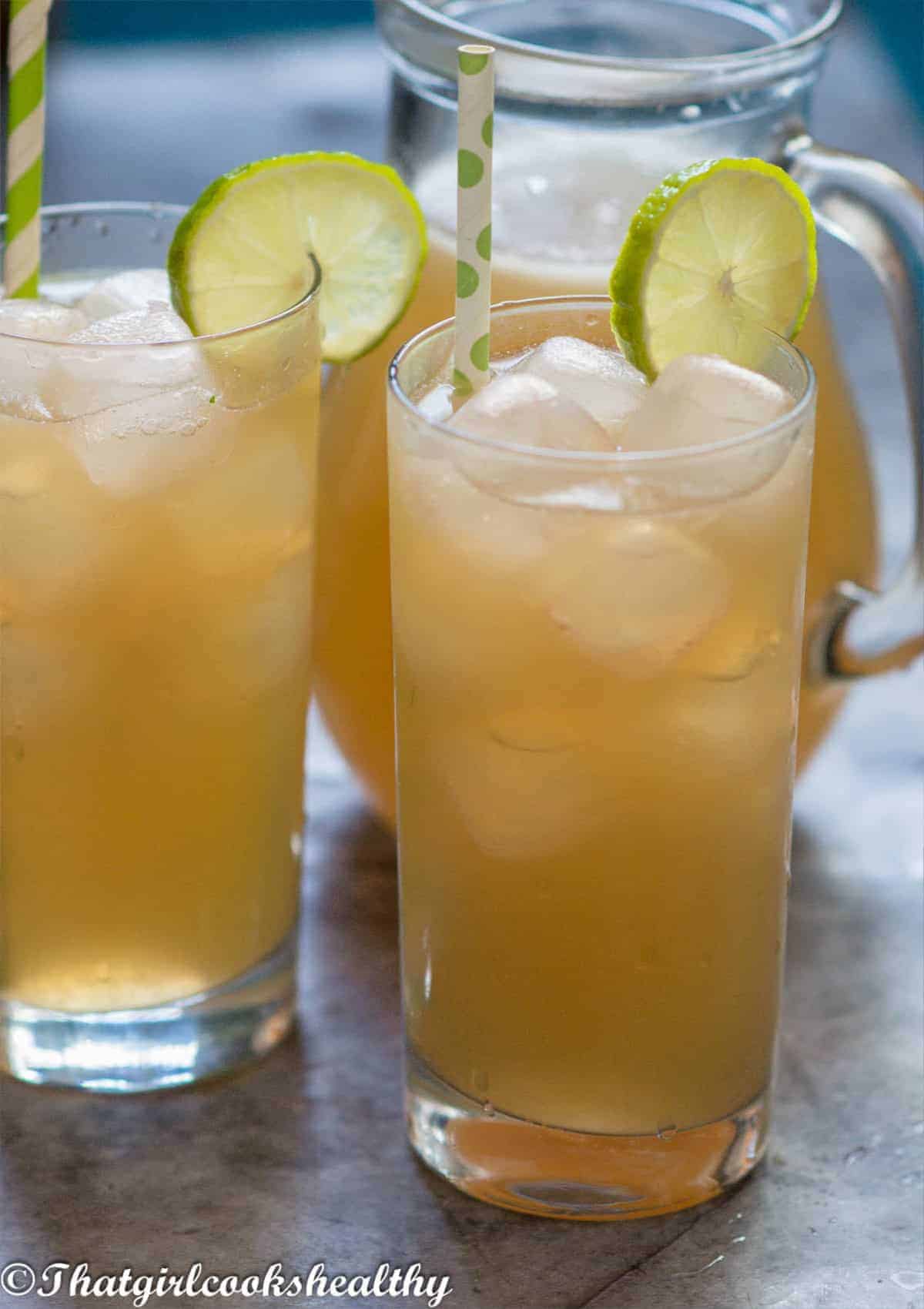 tall glass of lemonade with straw
