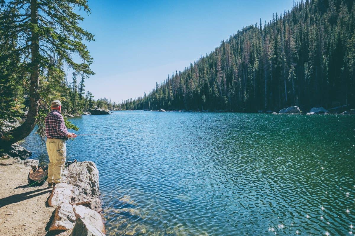 Man fishing at Emerald Lake in Colorado