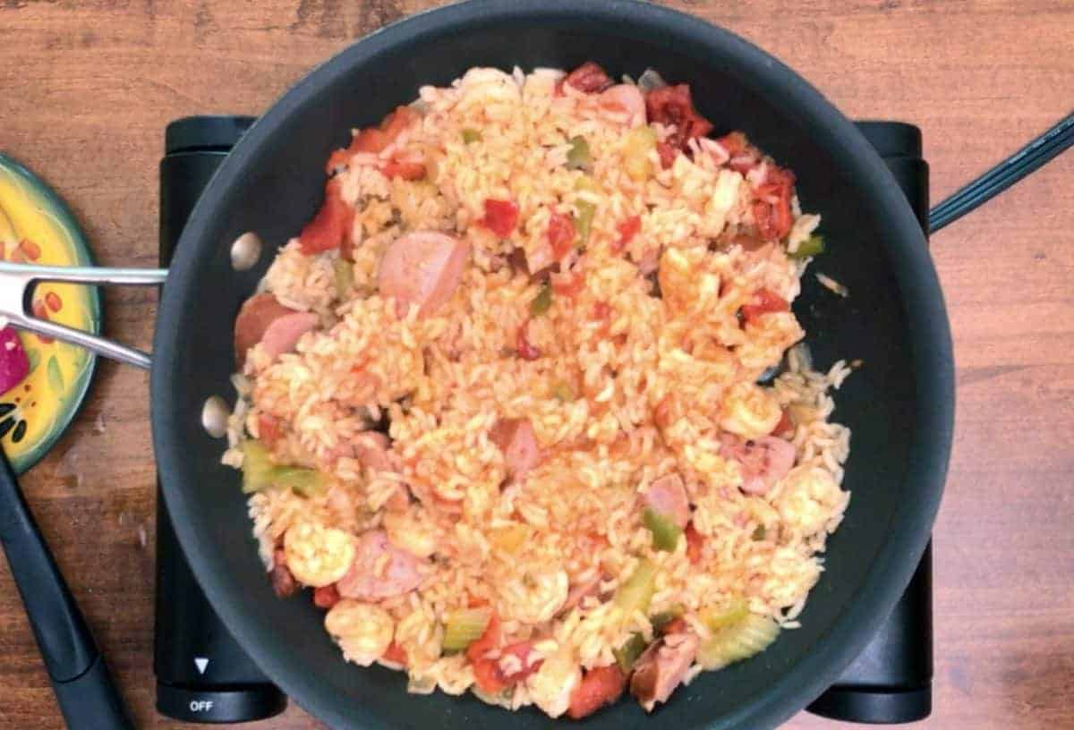 an overhead picture of jambalaya in a skillet.