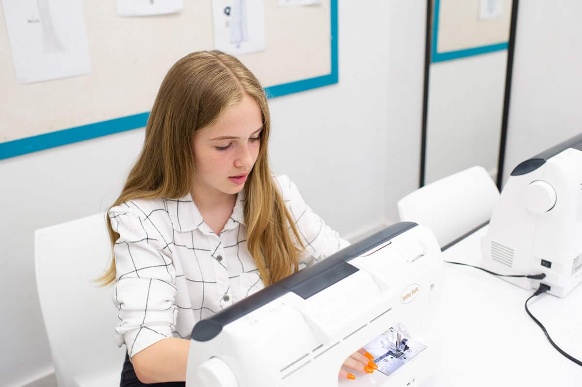 Youth sewing