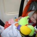 car seat on airplane, baby in car seat on plane, baby sleeping on plane, flying with a baby, flying with an infant