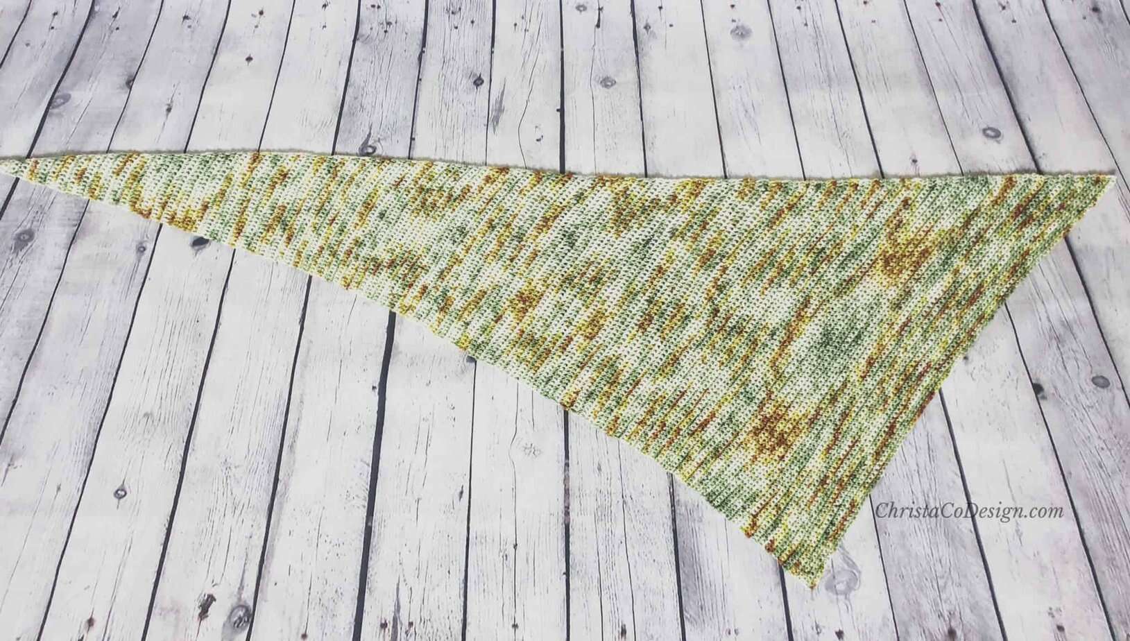 Picture of asymmetrical triangle scarf laid flat