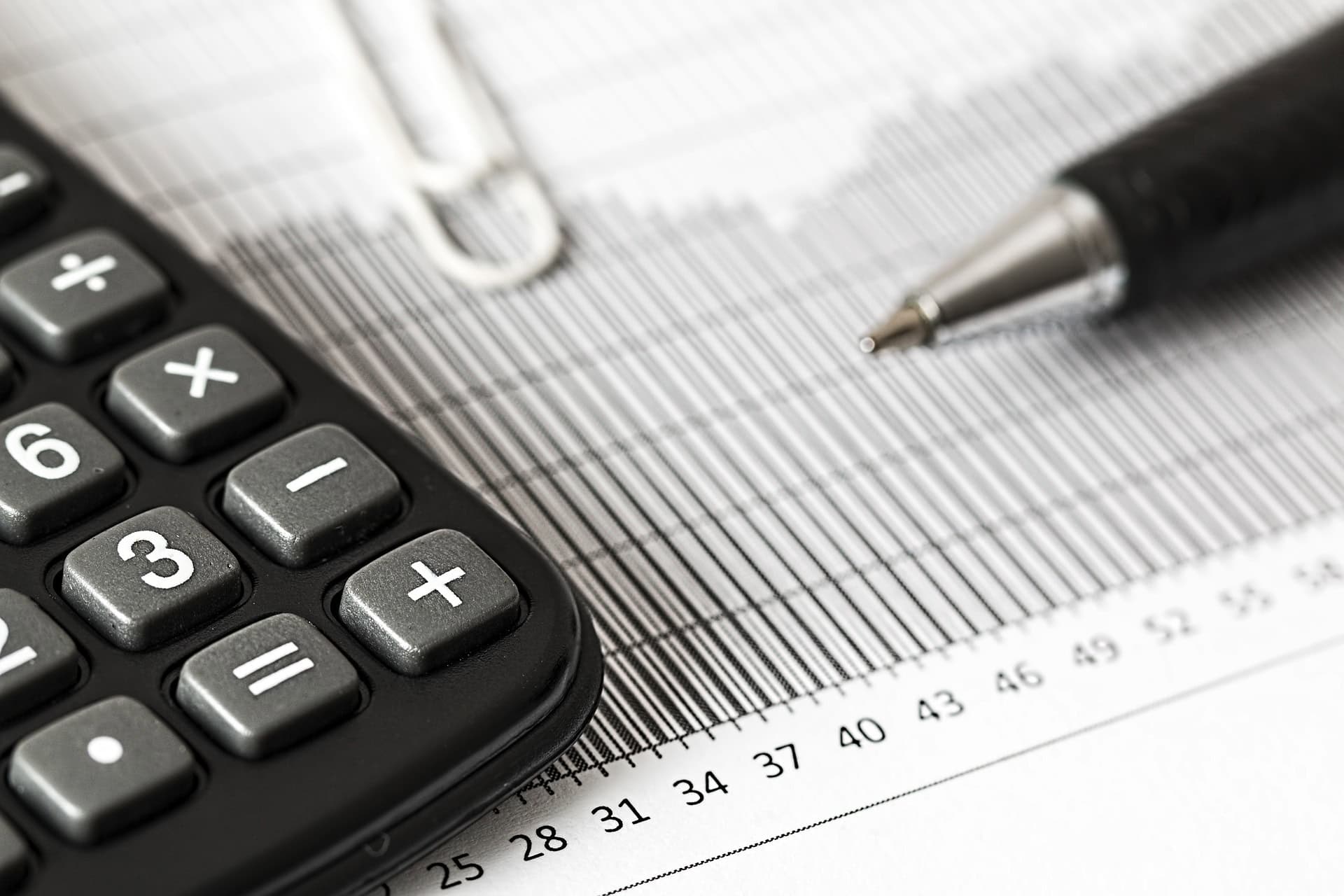 tax return, calculator and pen