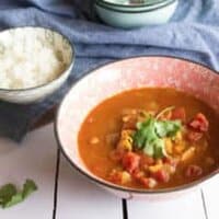 Image is of a bowl of chicken curry.