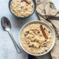 White and black bowl of rice pudding