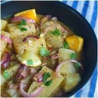 yuca with fruit in a skillet
