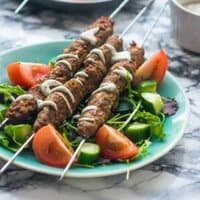 koftas on a teal plate