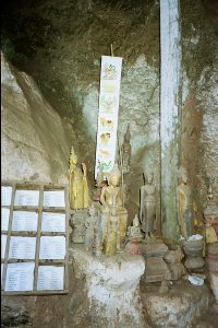 Pak Ou caves with miniature Buddha sculptures