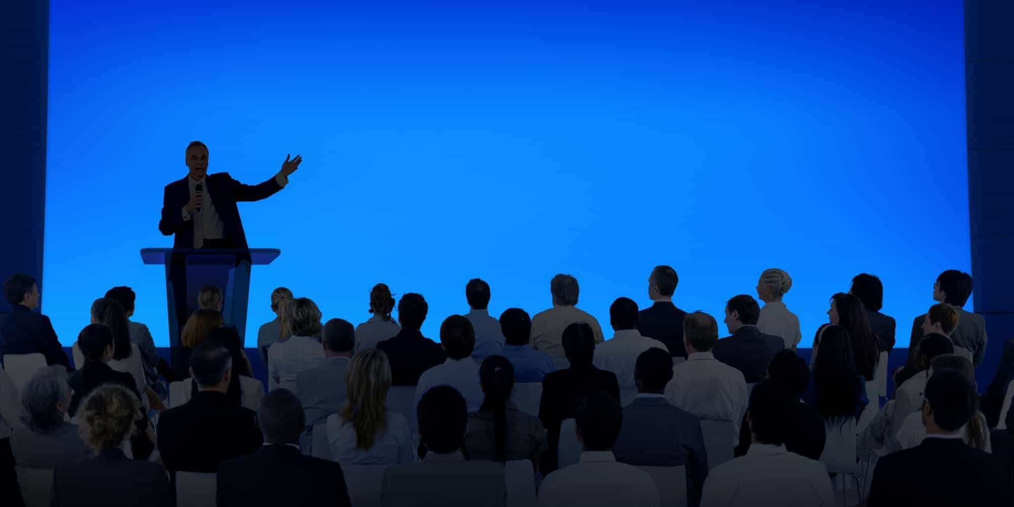 maxiom tech CEO Antonio Chagoury speaks at a convention
