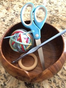 picture of colorful ball and scissors wood ring teether