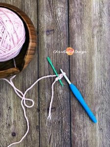 yarn bowl, pink yarn on crochet hook, fsc