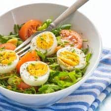Delicious low carb egg salad with a fork and cloth