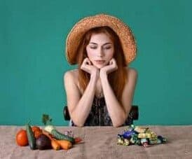 a escolha entre rebuçados e legumes