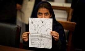 Drone victim shows image of US drone strike A drone victim holds up a drawing of the attack