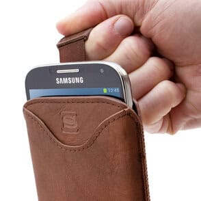 Samsung Galaxy S4 in a brown pouch.