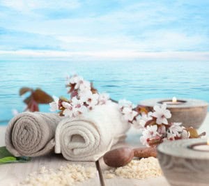 rolled towels and candles