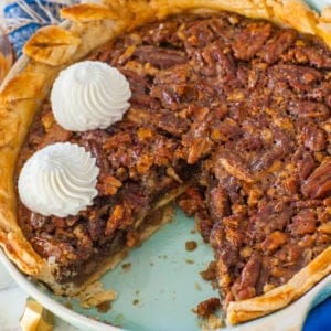 classic pecan pie recipe with no corn syrup; topped with whipped cream