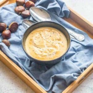 Soup in a brown box with blue cloth