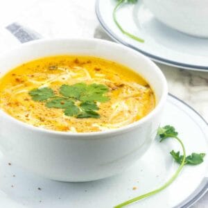 soup in a white soup on a side dish
