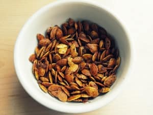curry pumpkin seeds in a bowl