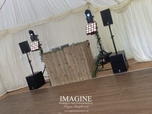 Rustic booth in a marquee setting