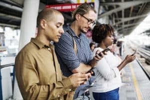 People on phones representing the best social media campaigns of 2018