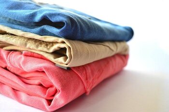Clothes folded for packing.