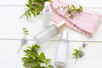 bottles of toners on white background