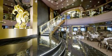 The msc divina relies on glitz for its ambience, like this dining room with gold detail.
