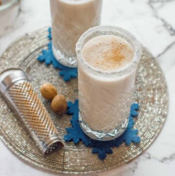 coquito with nutmeg shells