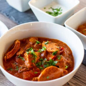 Slow Cooker Butter Chicken and condiments