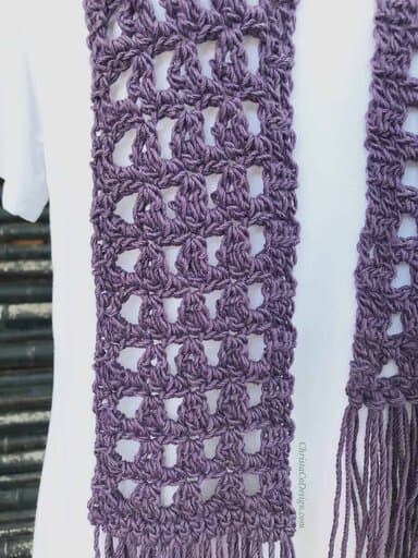 picture of purple crochet lace scarf on white