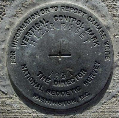 National Geodetic Survey vertical control mark, Santa Rita Bridge, California State Highway 152. Photo: Michelle Sneed, USGS. Public domain.