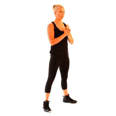 women performing squat gif
