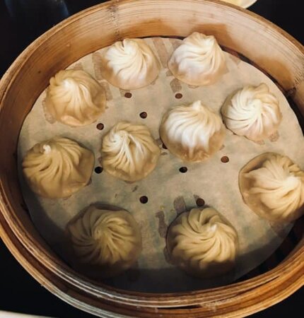 A basket of dumplings from din tai fung in university heights.