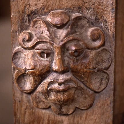 Green Man at a door