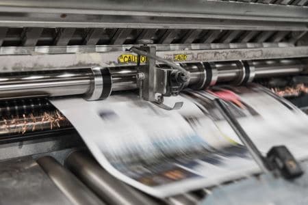 Printing press rolling by Bank Phrom