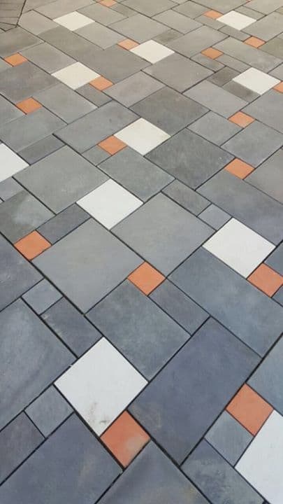 muli-coloured stone flooring with white, grey and orange flooring