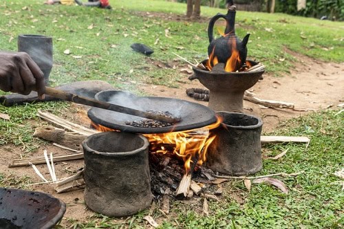 Ethiopia Itinerary: Roasting of coffee beans on in southern Ethiopia. Image courtesy Glen Pearson / iStock.