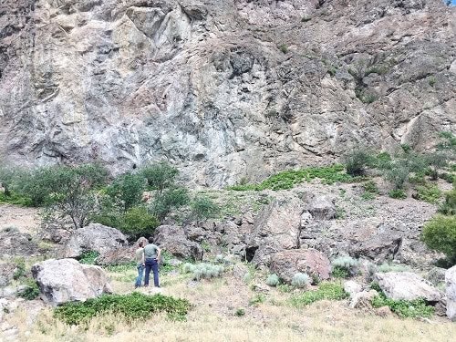 Standing at the base of Peach Cliff. Image courtesy Jeannette LeBlanc.