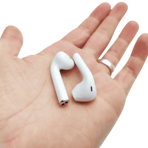 Image shows the earbuds on the palm of my left hand.
