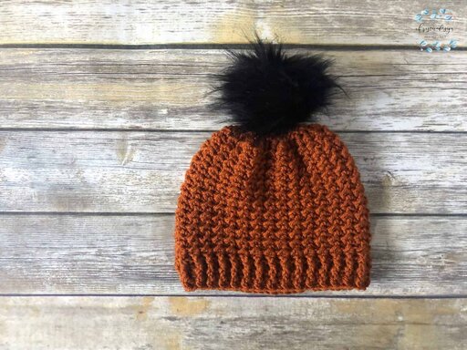 picture of one skein textured rust colored hat