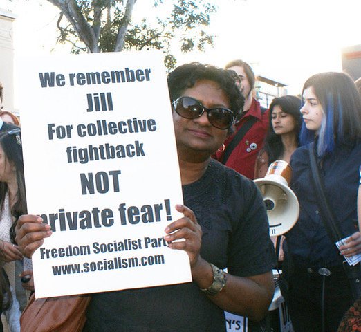 Man holding sign at protest